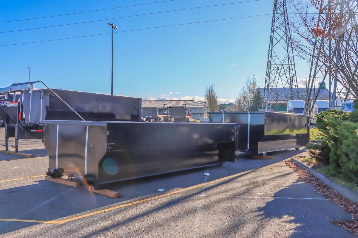 Roll-off dumpster ready for waste disposal at job site for 12 Yard Dumpster Rental in Fife